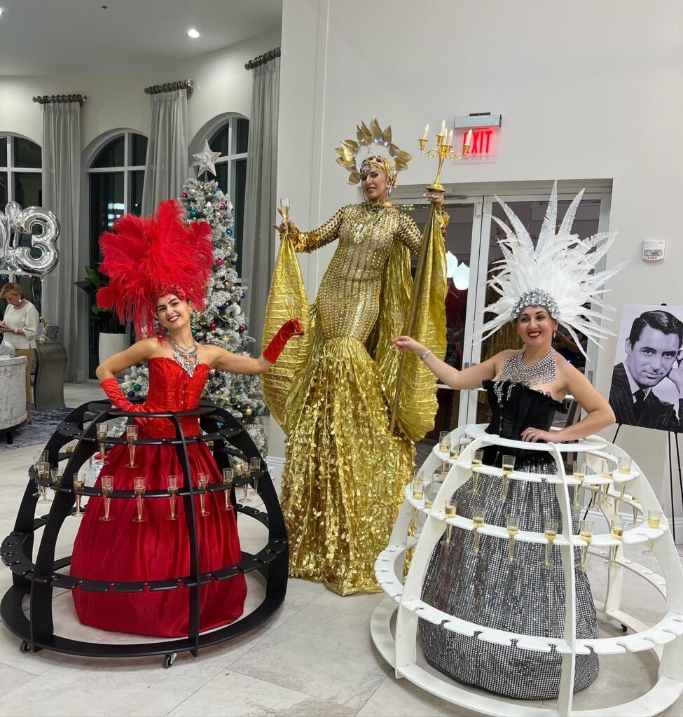 Strolling table performer wearing an elaborate costume at a themed corporate gala