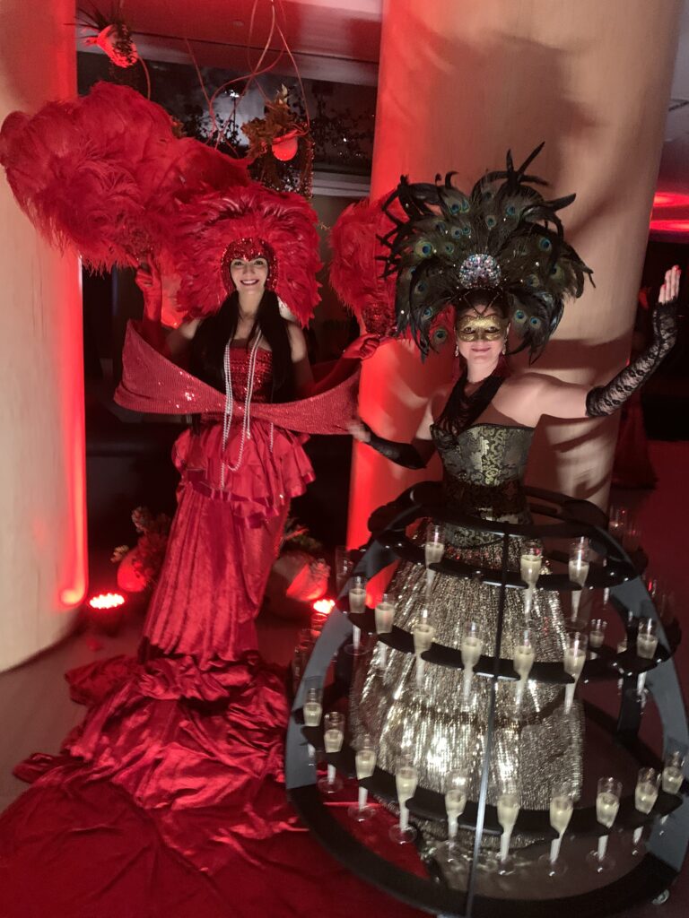 Champagne dress entertainer serving drinks during a luxury wedding reception