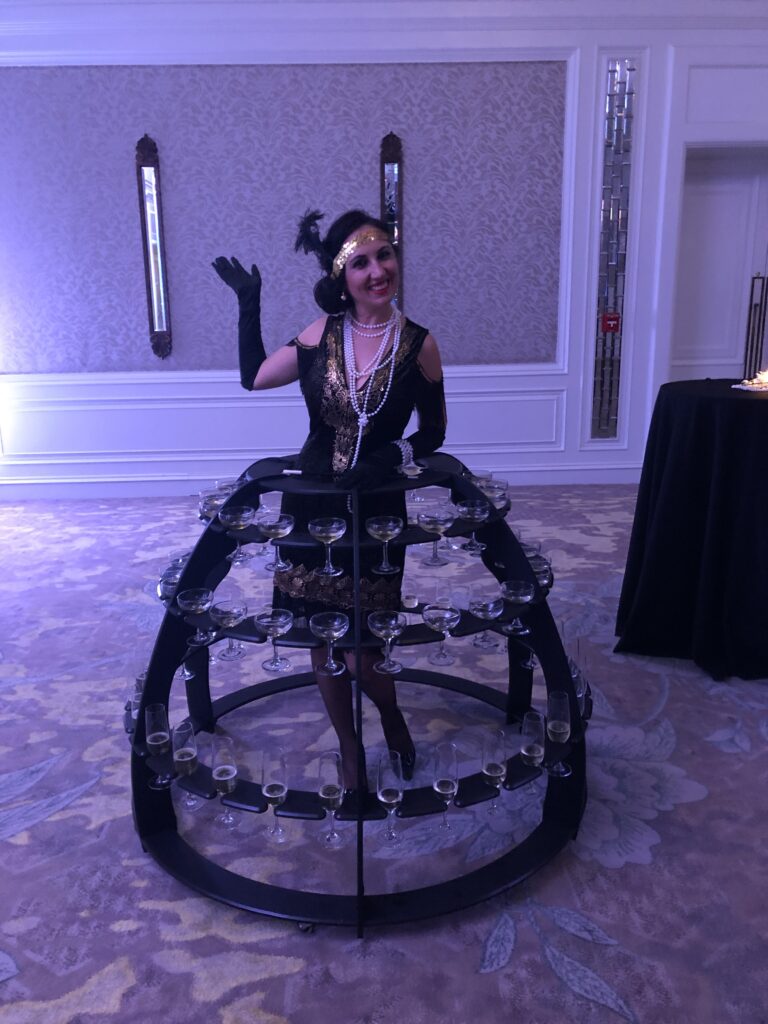 Professional champagne strolling table entertainment for an exclusive VIP event
